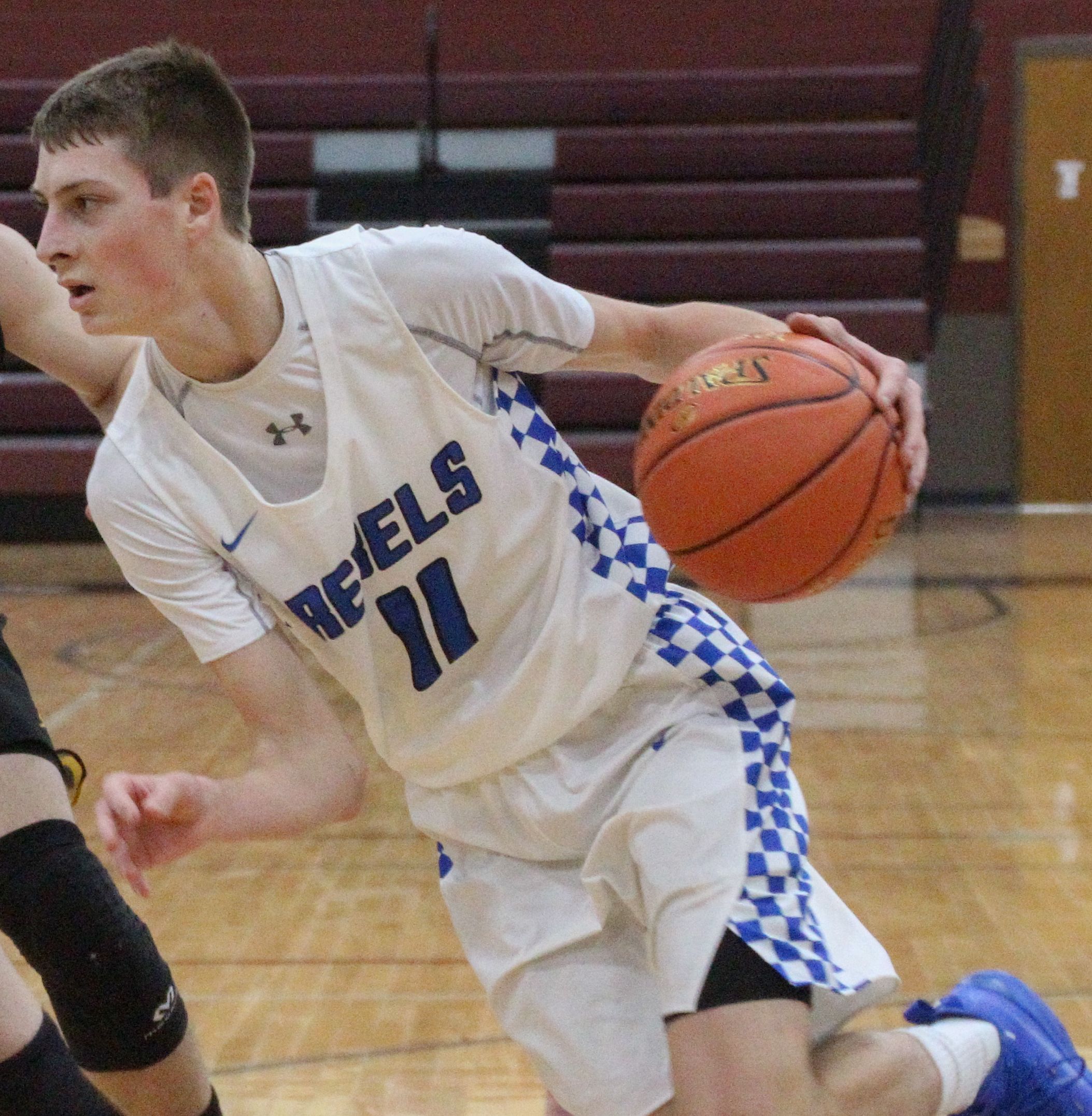 Gladbrook-Reinbeck boys basketball, led by sophomore and NICL West Outstanding Player William Kiburis, made the deepest run of the area boys basketball teams in 2021 as the Rebels bowed out to South Winneshiek in the substate final. (Jake Ryder photo)