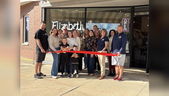 Owner, Katie Lewis and her husband Jordan Lewis and their family cut the ribbon for their Grand Opening of Elizabeth Lea Boutique, named after their children. Photos taken by Michelle Kennedy