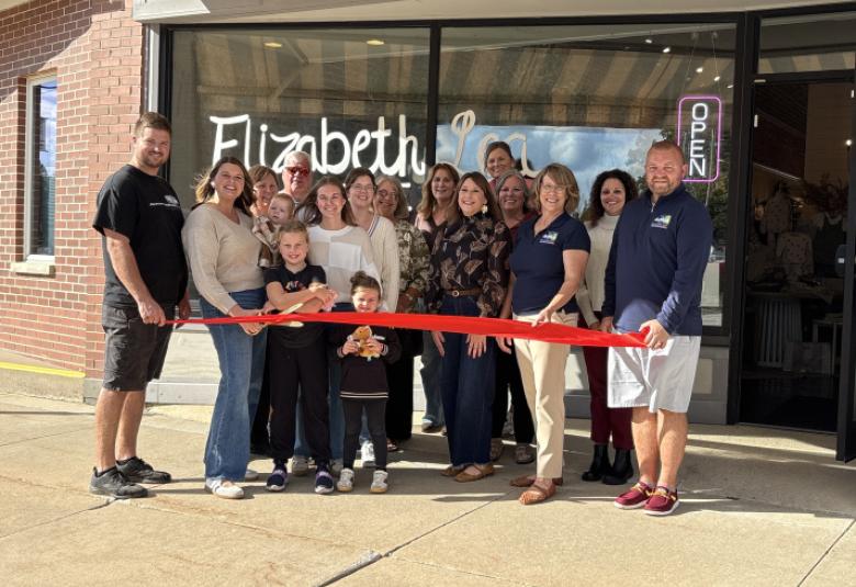 Owner, Katie Lewis and her husband Jordan Lewis and their family cut the ribbon for their Grand Opening of Elizabeth Lea Boutique, named after their children. Photos taken by Michelle Kennedy